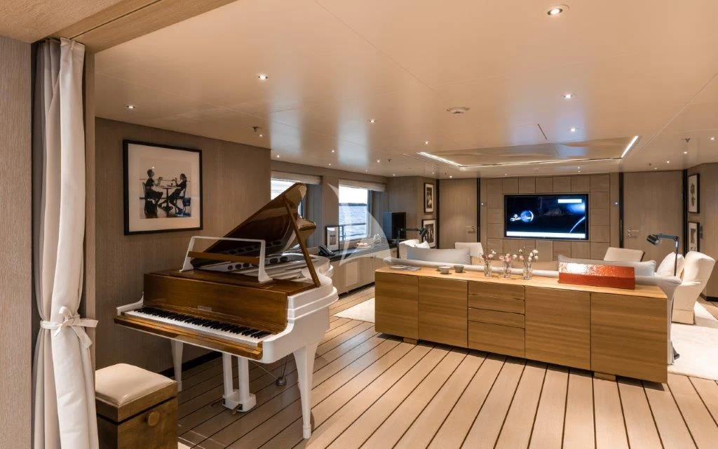 a large room with a piano and a piano aboard GRACE (YET) Yacht for Sale