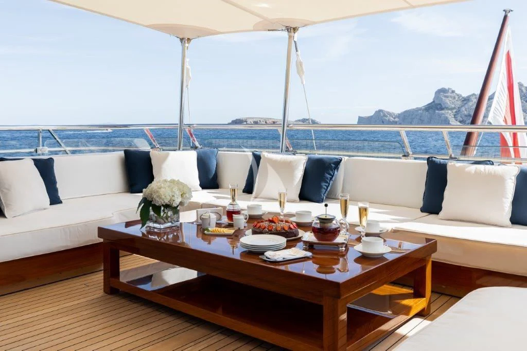 a table with food on it aboard GRACE (YET) Yacht for Sale