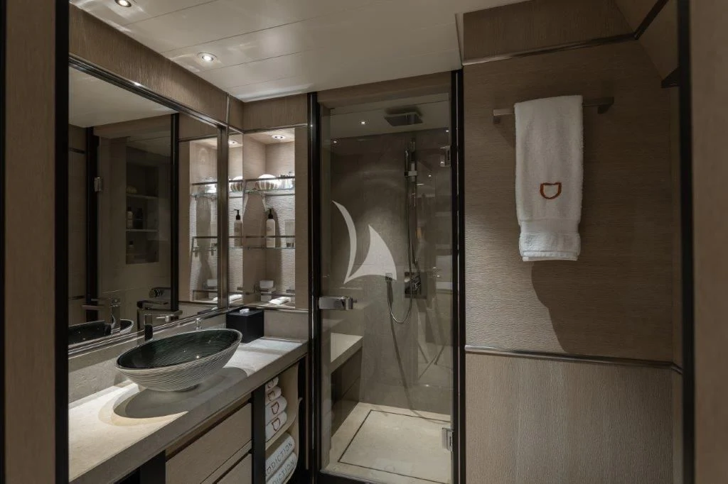 a bathroom with a sink and a mirror aboard GRACE (YET) Yacht for Sale
