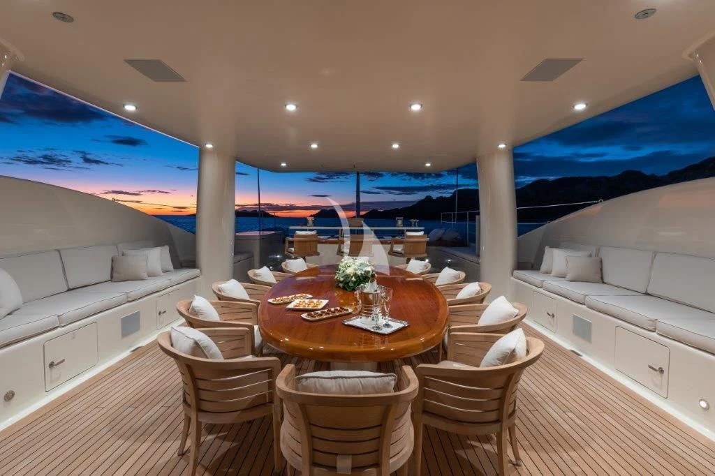 a room with a table and chairs aboard GRACE (YET) Yacht for Sale