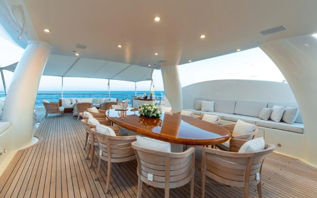 a room with a table and chairs aboard GRACE (YET) Yacht for Sale