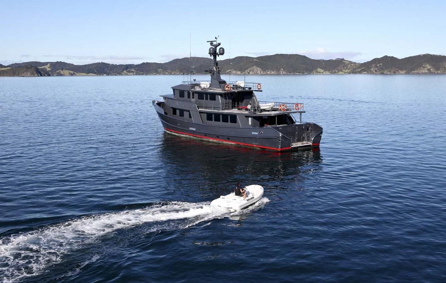 a boat on the water aboard PACIFIC HQ Yacht for Sale