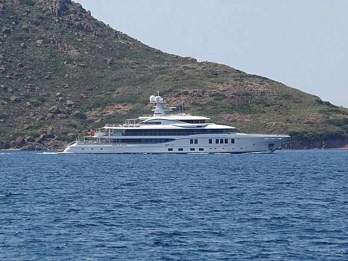 a large white boat on the water aboard PLVS VLTRA Yacht for Sale