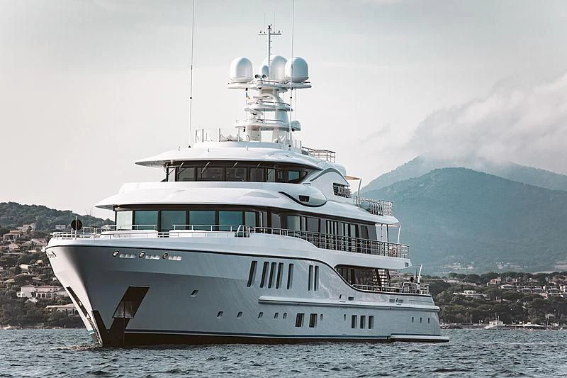 a large white boat in the water aboard PLVS VLTRA Yacht for Sale