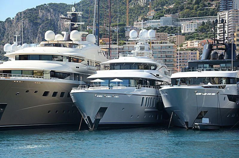 a group of boats in a harbor aboard PLVS VLTRA Yacht for Sale