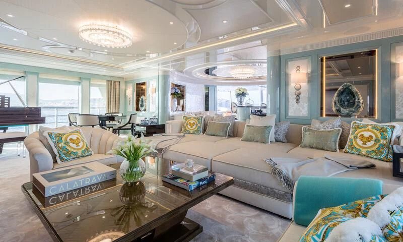 a living room with a large window aboard PLVS VLTRA Yacht for Sale