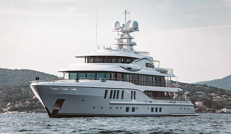 a large white ship in the water aboard PLVS VLTRA Yacht for Sale