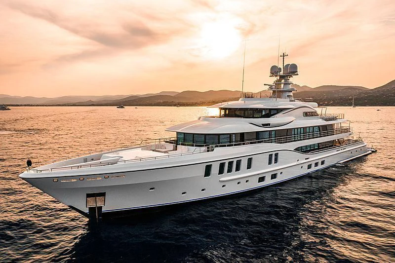 a large white boat in the water aboard PLVS VLTRA Yacht for Sale