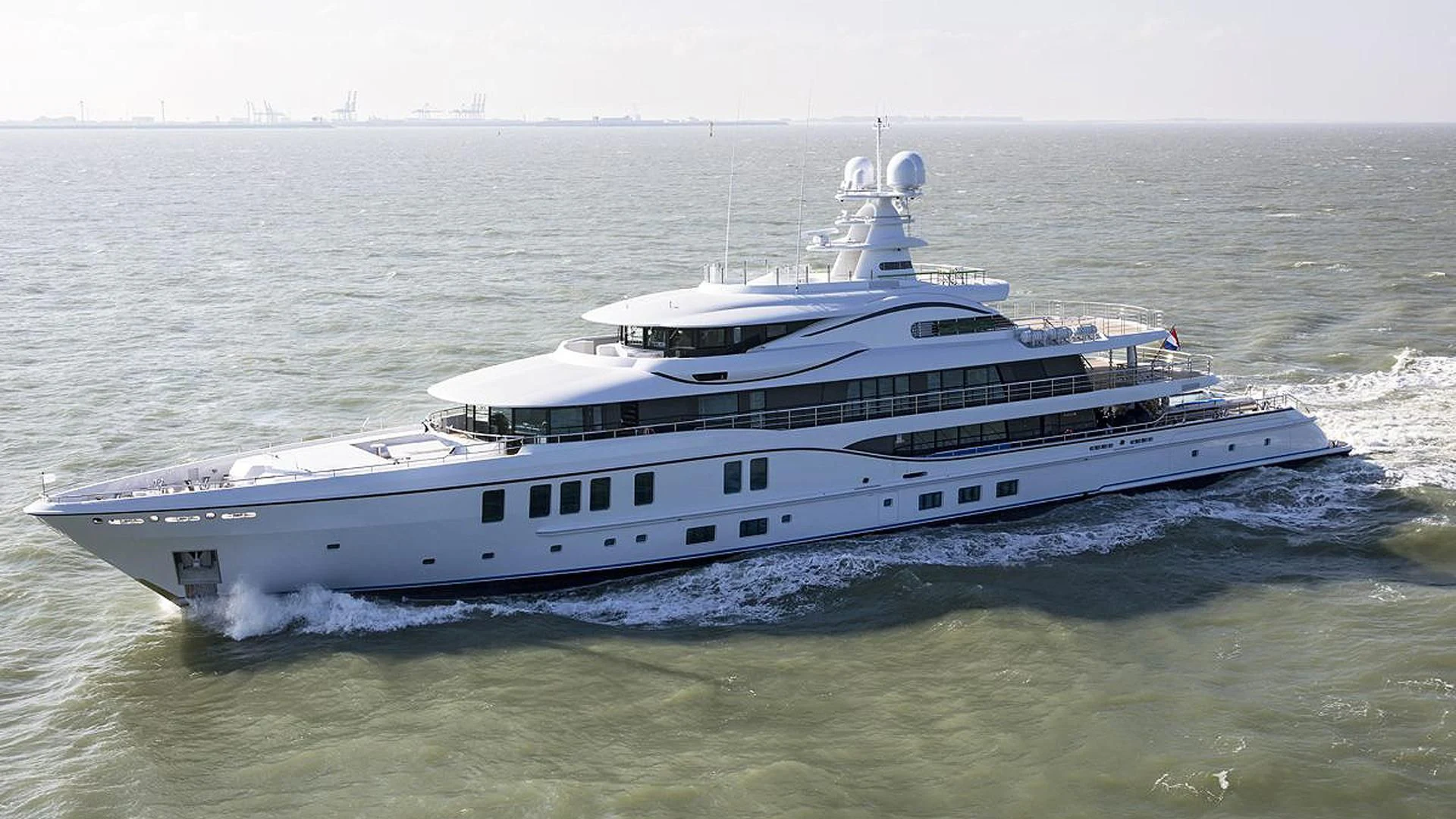 a large white boat in the water aboard PLVS VLTRA Yacht for Sale