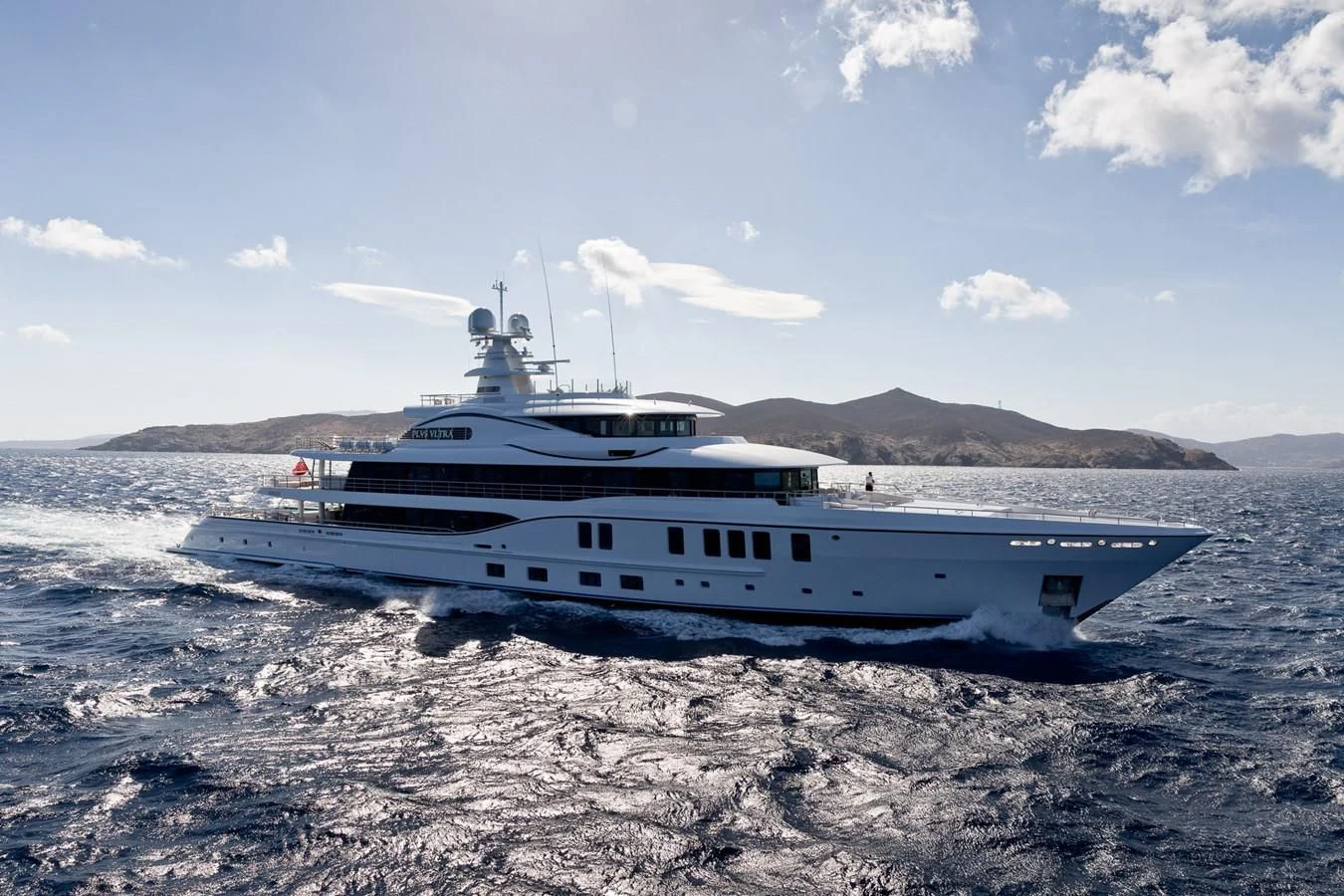 a boat on the beach aboard PLVS VLTRA Yacht for Sale