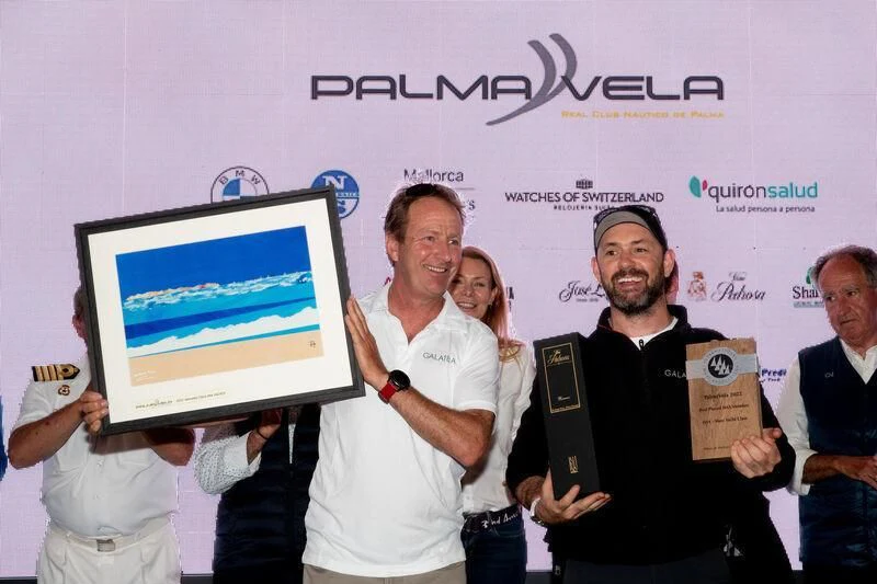 a group of people holding awards aboard GALATEIA Yacht for Sale