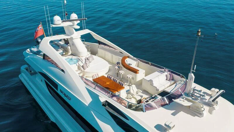 a boat on the water aboard BLACK SHEEP Yacht for Sale