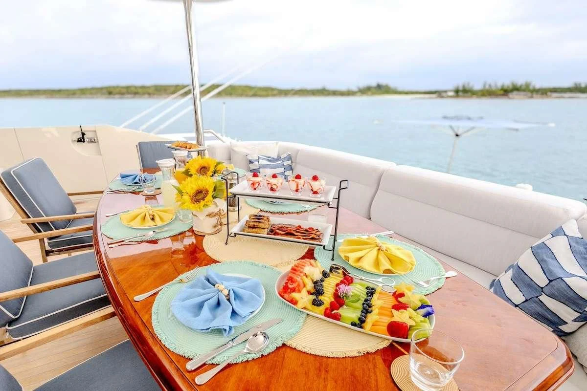 a table with food on it aboard BLACK SHEEP Yacht for Sale