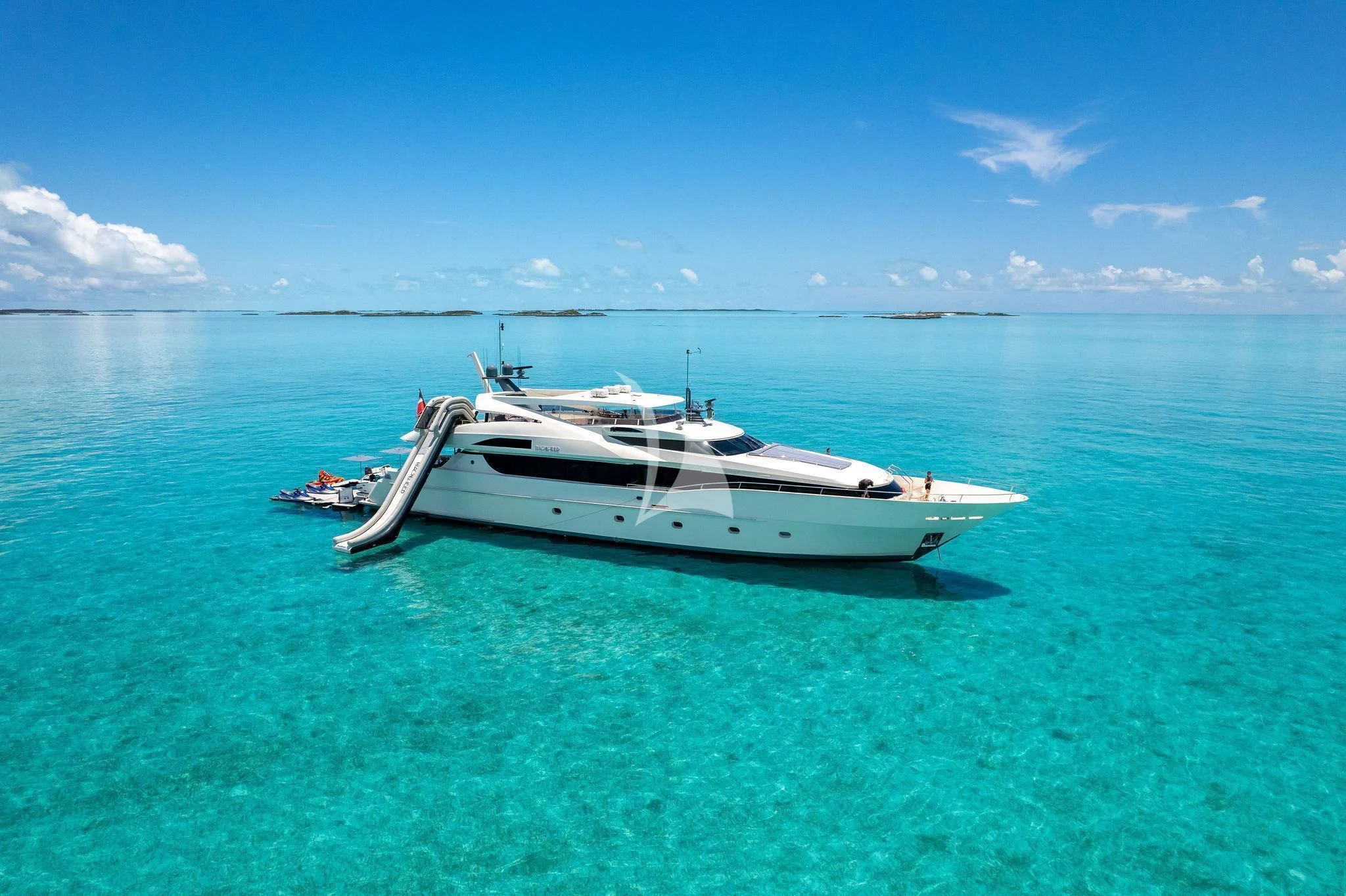 a white yacht in the water aboard BLACK SHEEP Yacht for Sale