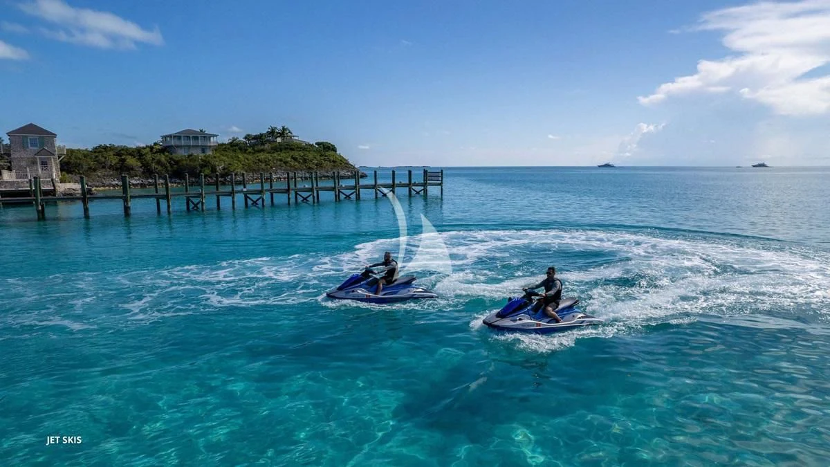 a person on a jet ski in the water aboard BLACK SHEEP Yacht for Sale