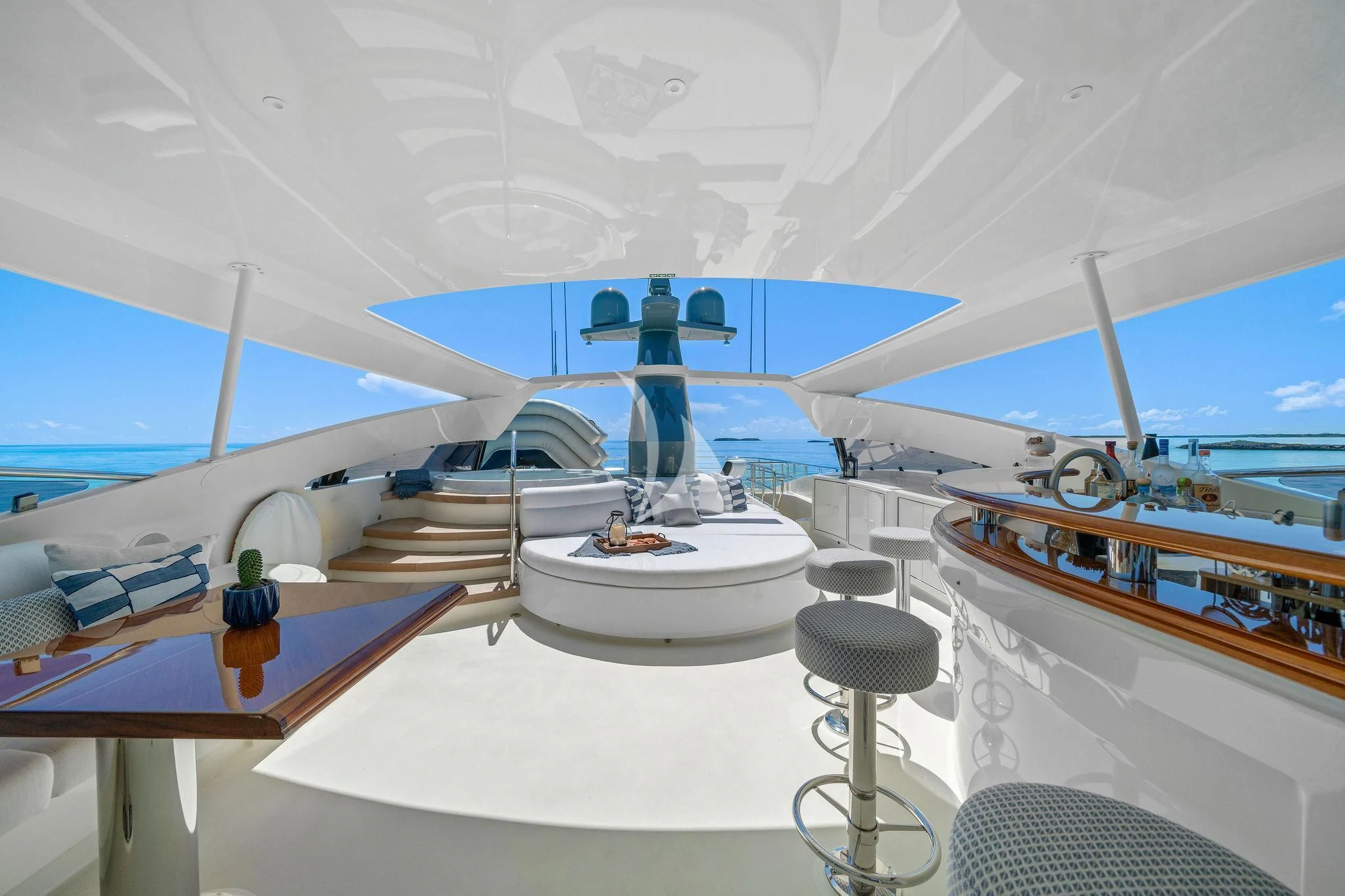 a room with a white table and a blue object on the wall aboard BLACK SHEEP Yacht for Sale