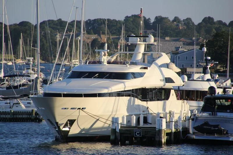 a group of boats in a harbor aboard BLACK SHEEP Yacht for Sale