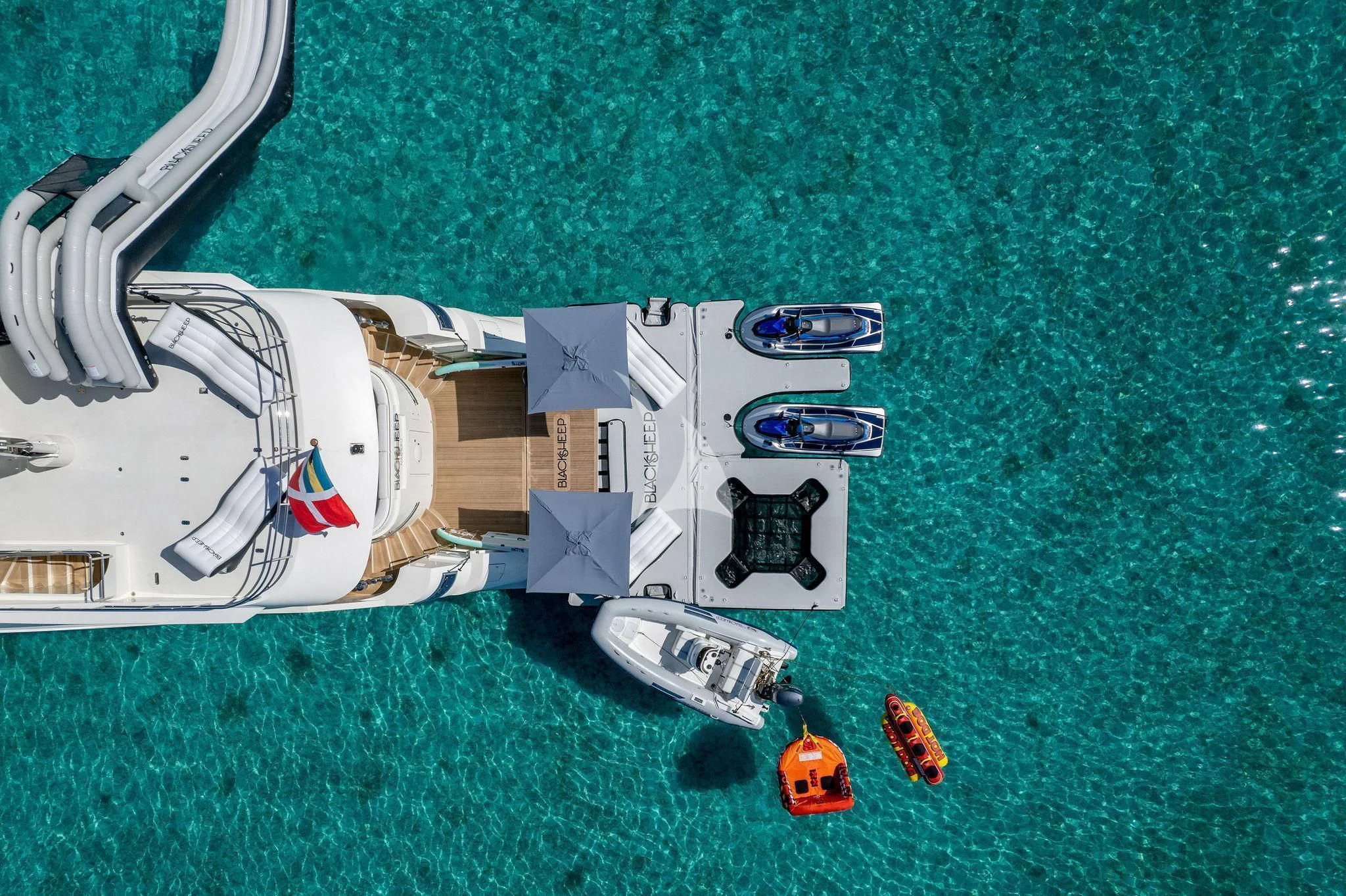 a helicopter on the ground aboard BLACK SHEEP Yacht for Sale