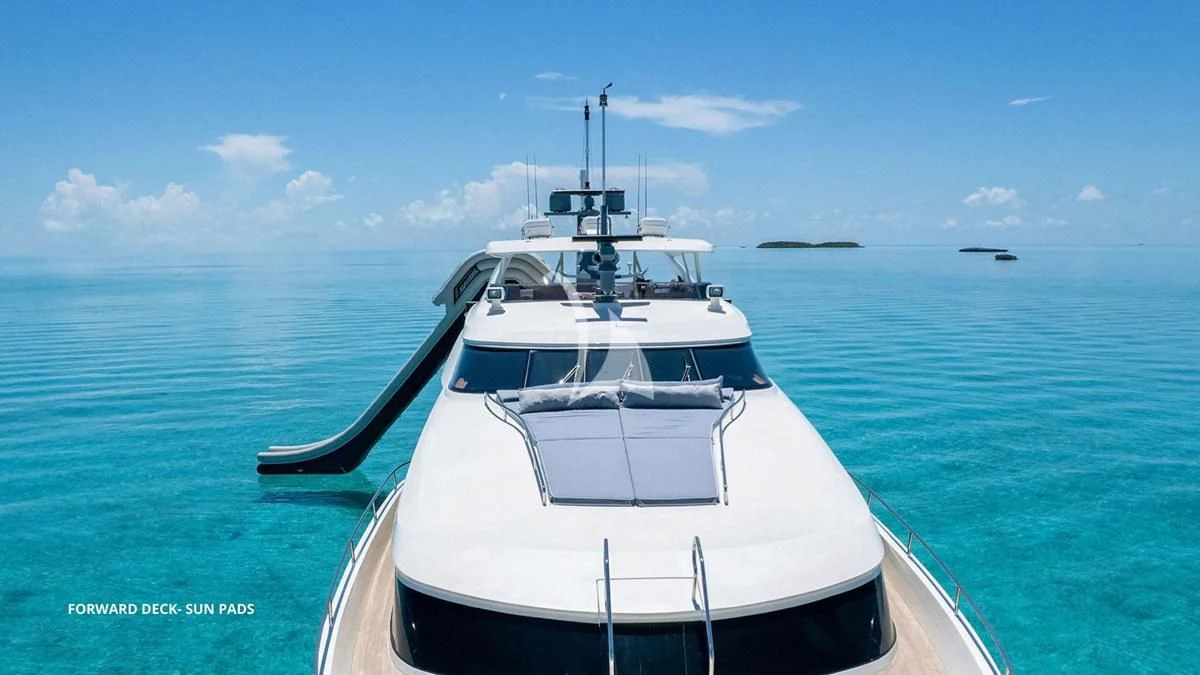 a white boat in the water aboard BLACK SHEEP Yacht for Sale