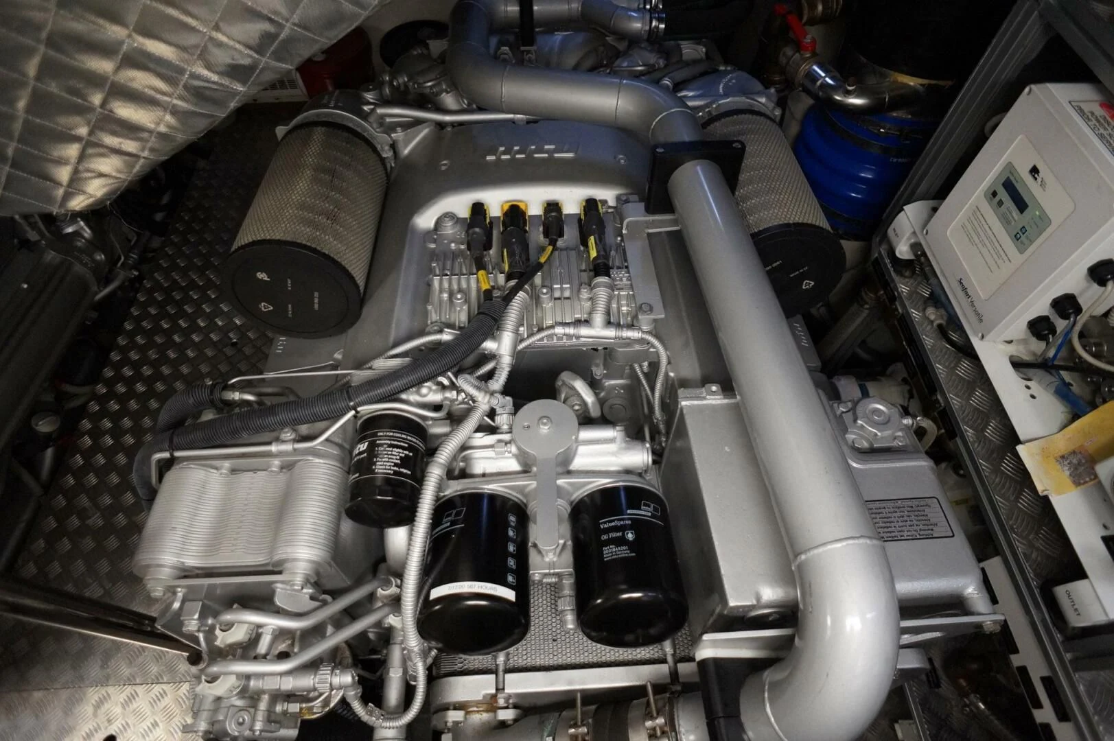 a car engine with a hood aboard THE OFFICE Yacht for Sale