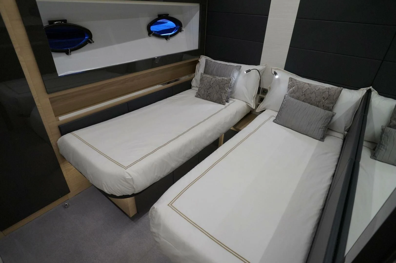 a room with two beds aboard THE OFFICE Yacht for Sale