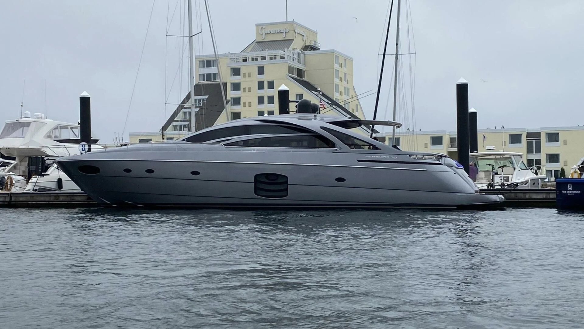 a white yacht in the water aboard THE OFFICE Yacht for Sale