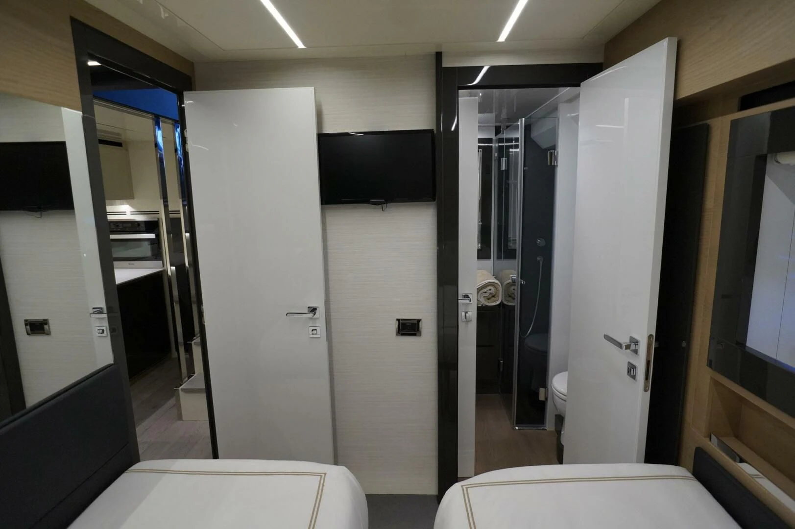 a room with several doors aboard THE OFFICE Yacht for Sale