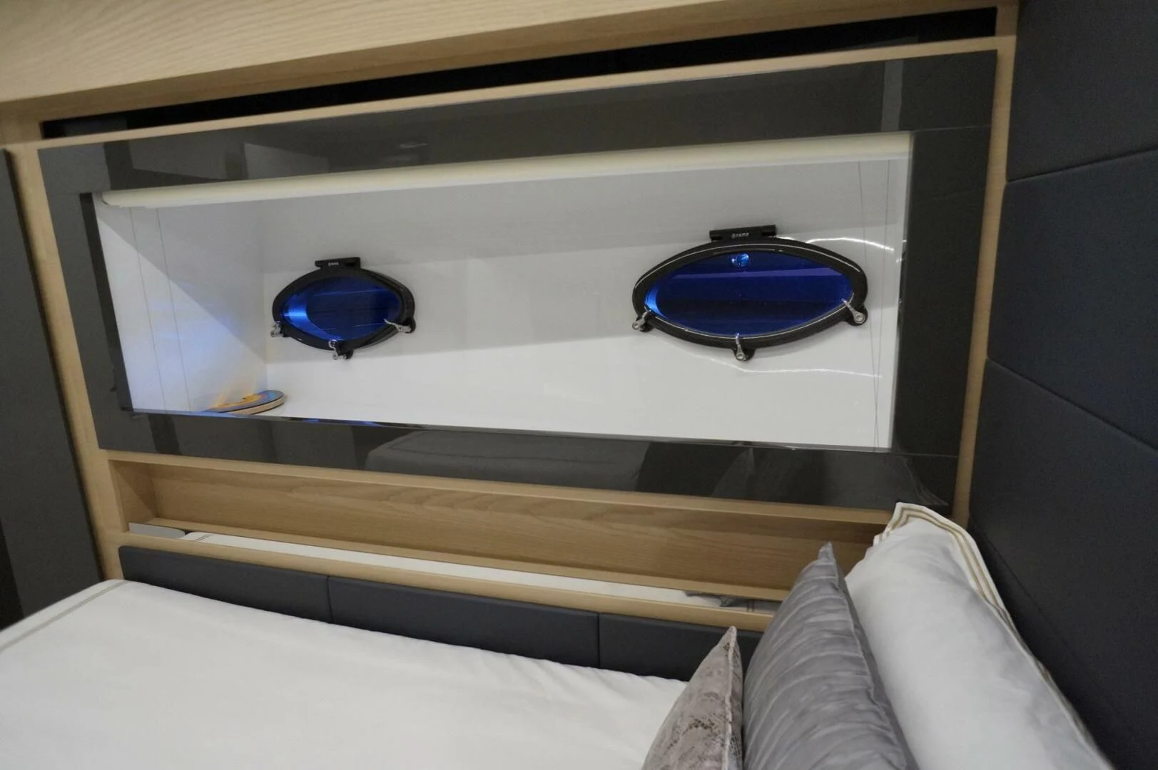 a shelf with a blue object on it aboard THE OFFICE Yacht for Sale