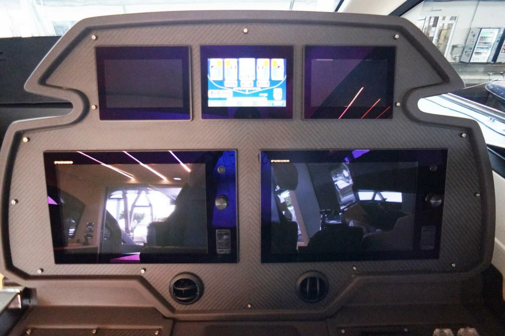 a vehicle with a screen on the window aboard THE OFFICE Yacht for Sale
