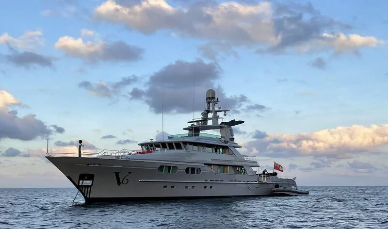 a large white boat in the water aboard V6 Yacht for Sale