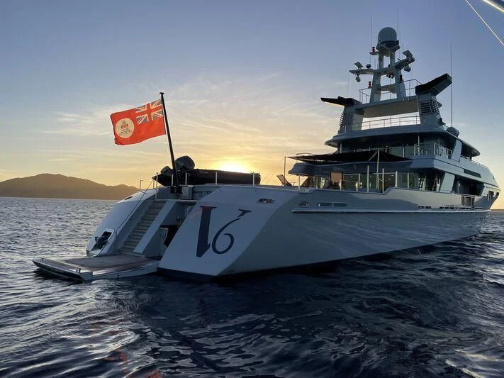 a large ship in the water aboard V6 Yacht for Sale