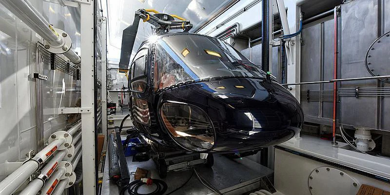 a car in a factory aboard V6 Yacht for Sale