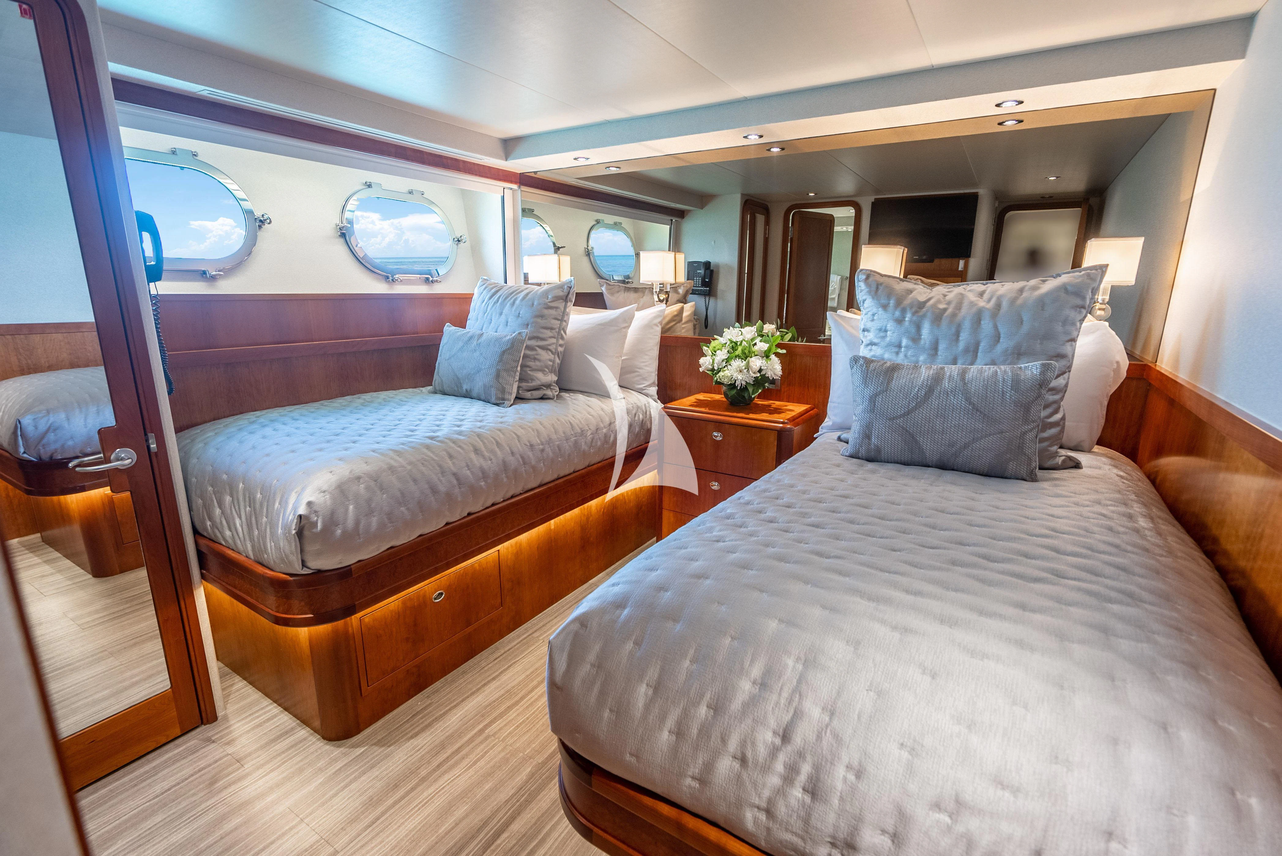 a bed in a room aboard KEMOSABE Yacht for Charter