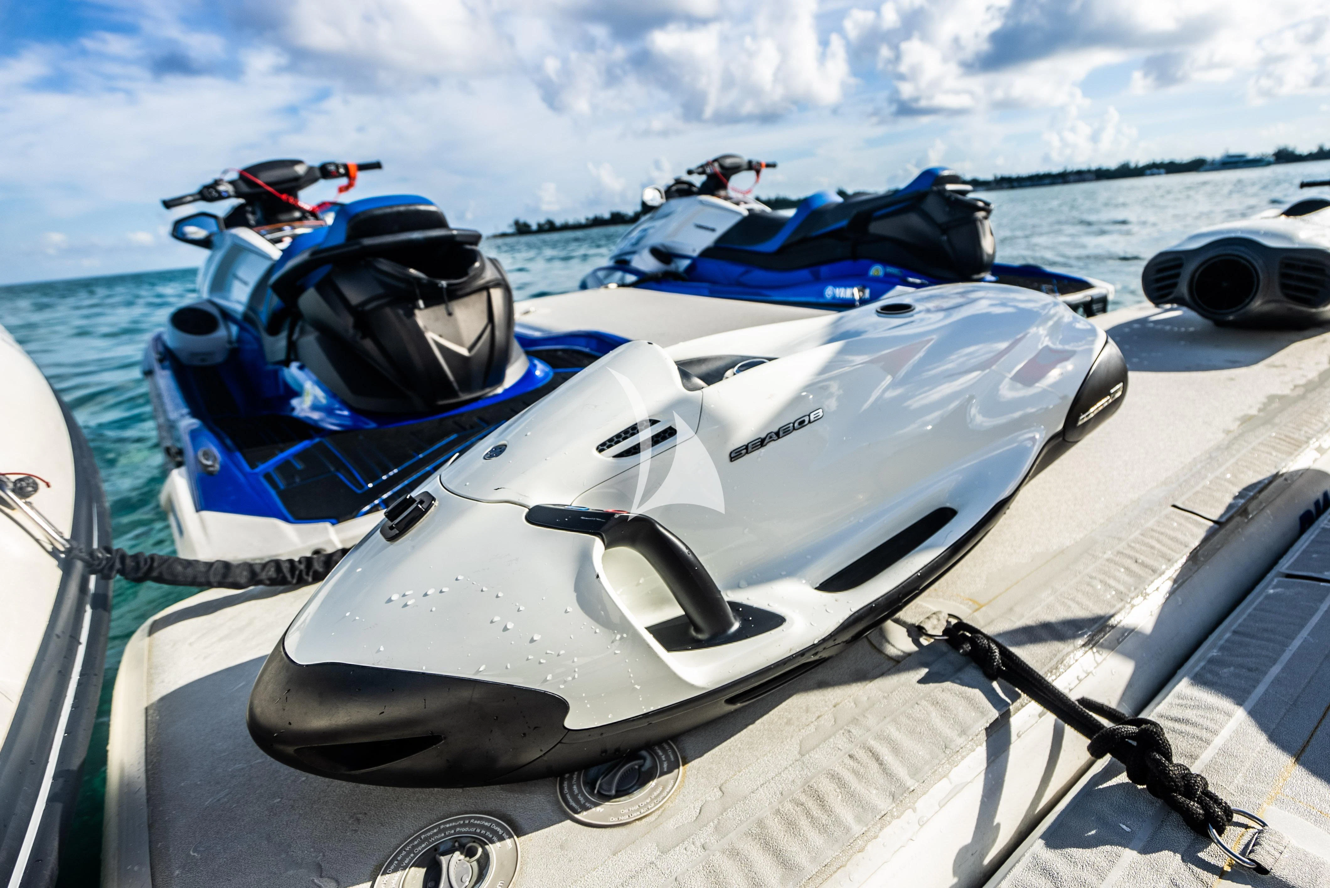 a boat with a motor attached to it aboard KEMOSABE Yacht for Charter