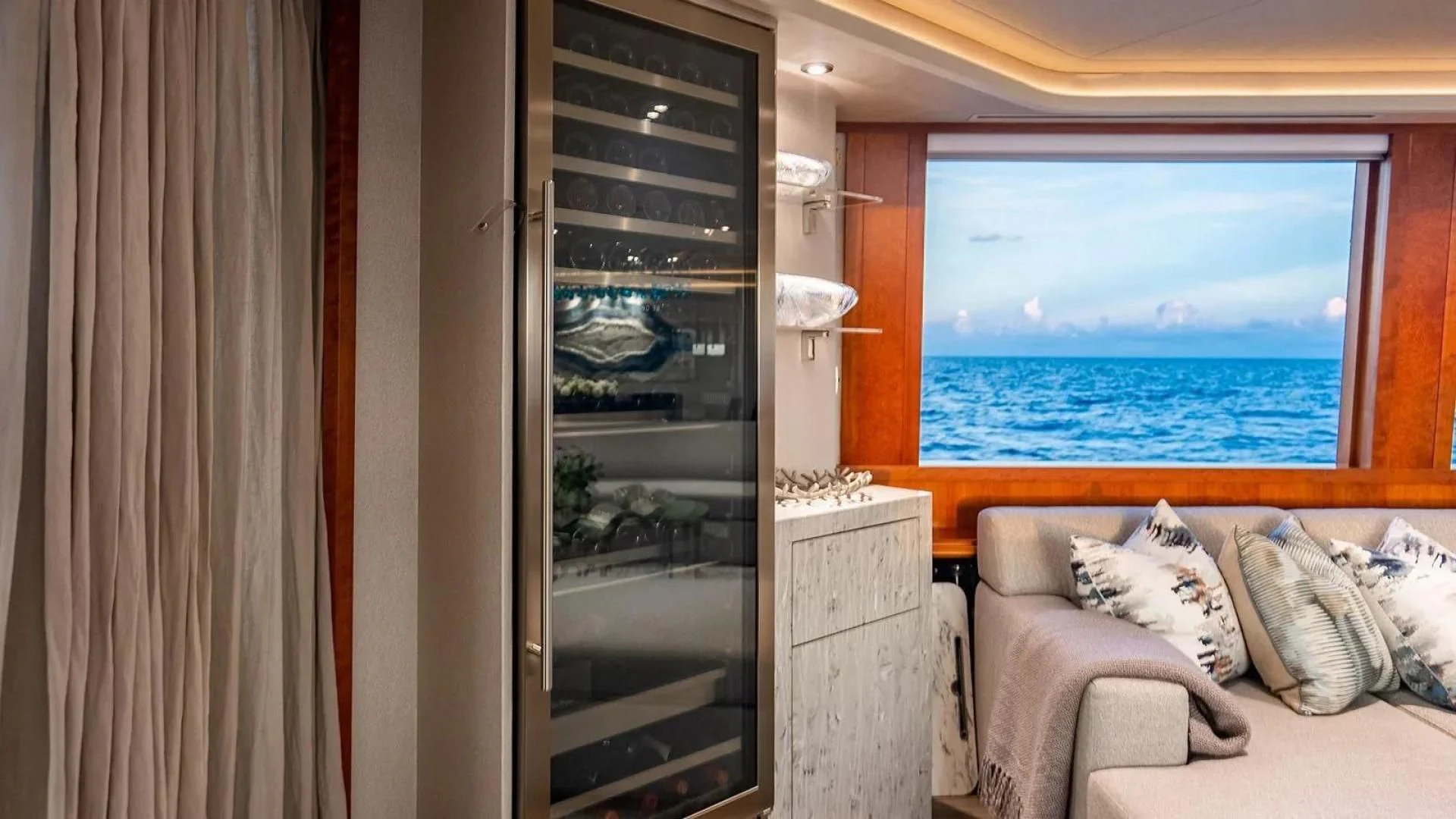 a room with a bed and a window aboard KEMOSABE Yacht for Charter