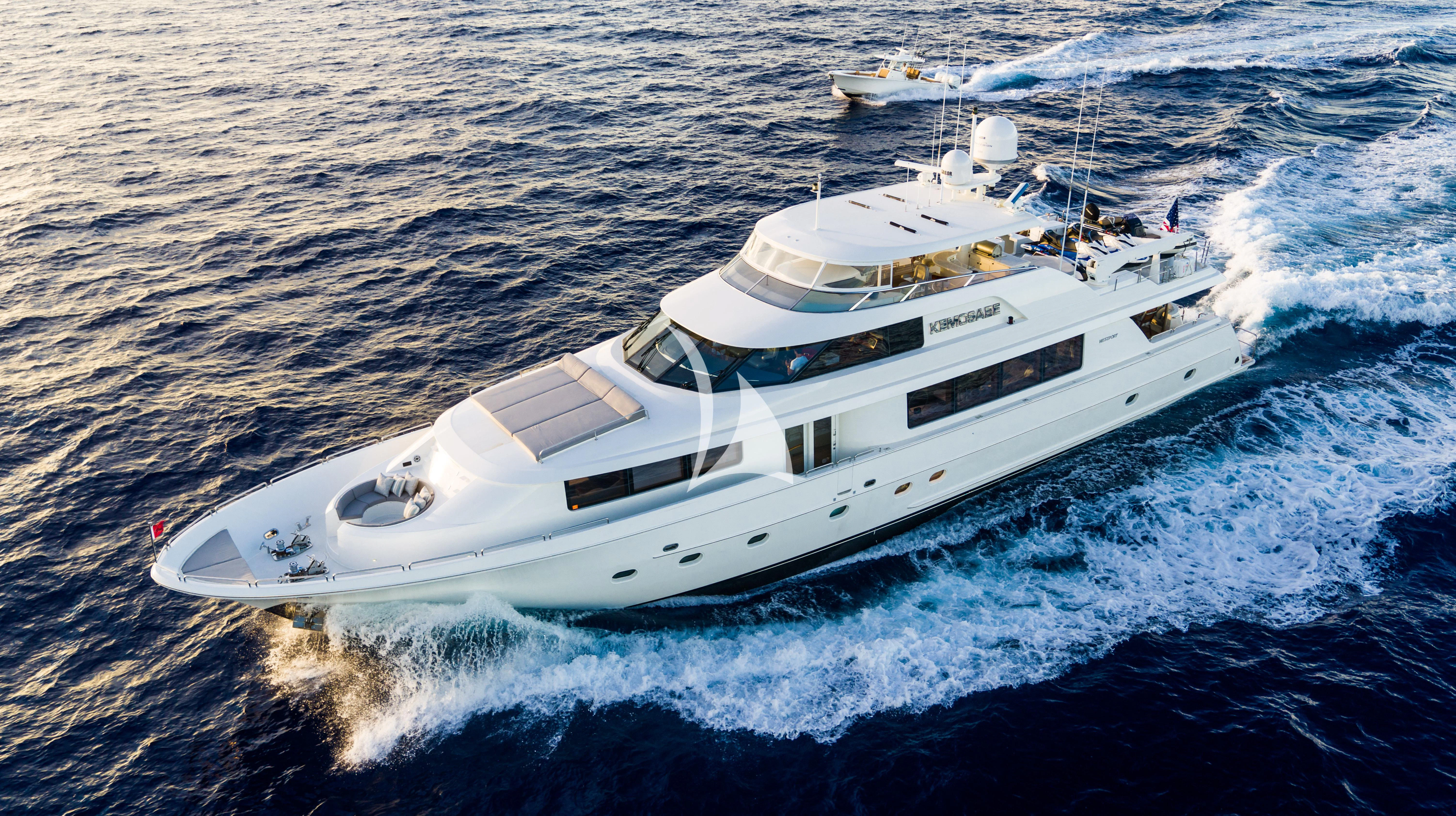 a white yacht on the water aboard KEMOSABE Yacht for Charter
