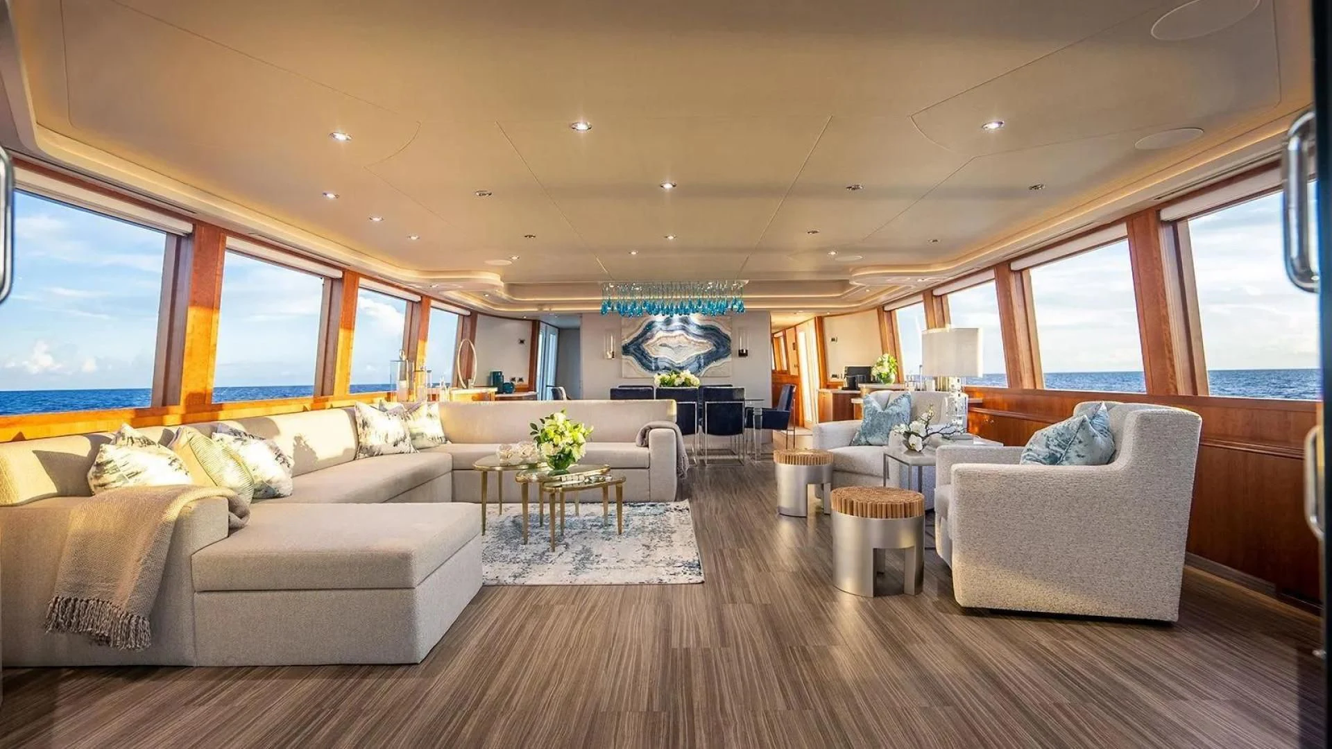 a living room with a wood floor aboard KEMOSABE Yacht for Charter