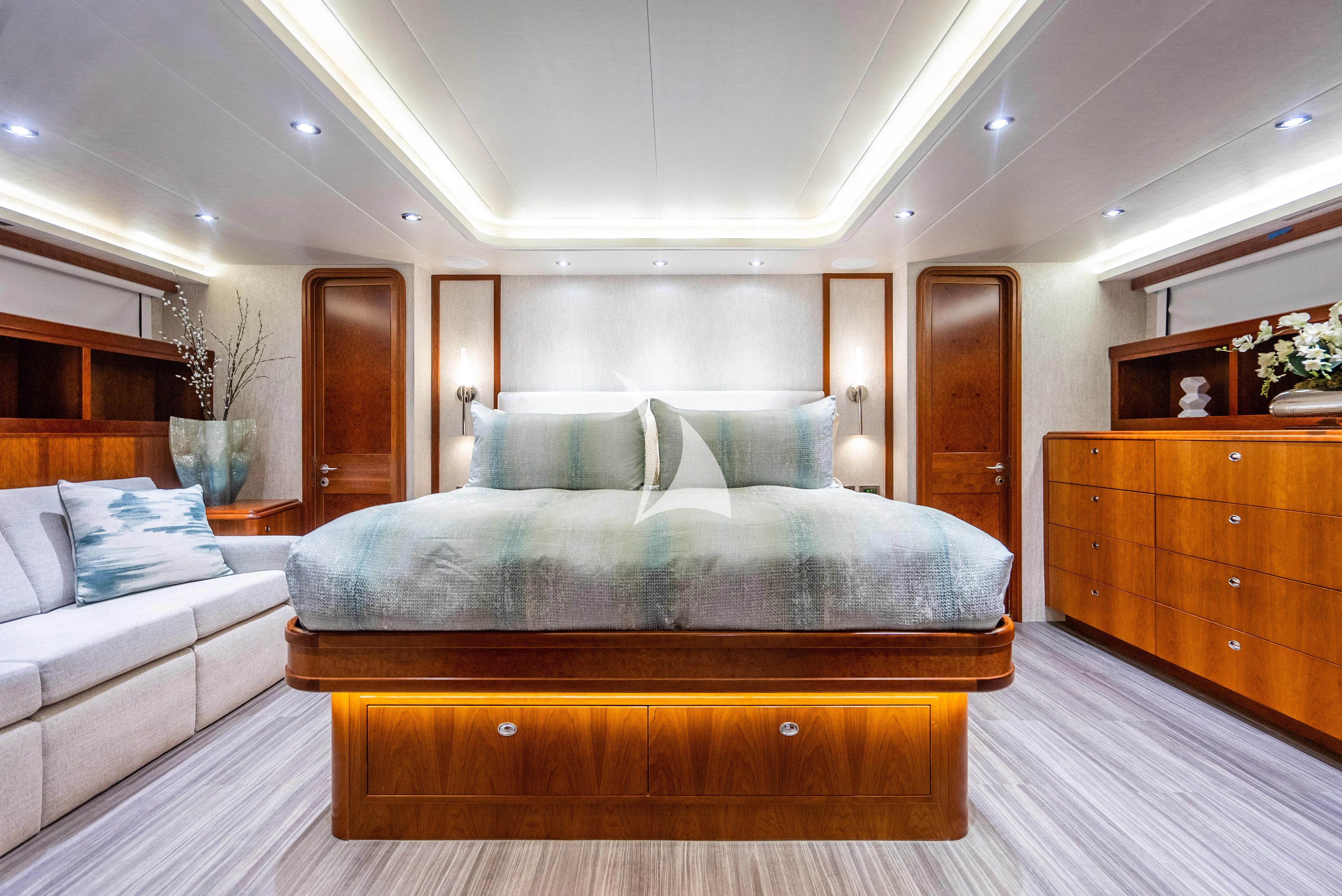 a bed in a room aboard KEMOSABE Yacht for Charter