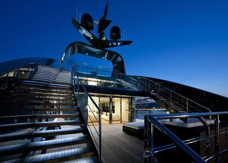 a large ship with a statue on the deck aboard OCEAN SAPPHIRE Yacht for Sale