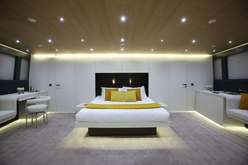a bed in a room aboard OCEAN SAPPHIRE Yacht for Sale