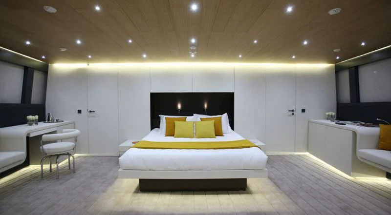 a bed in a room aboard OCEAN SAPPHIRE Yacht for Sale