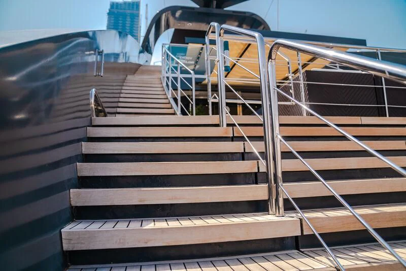 a staircase with railings aboard OCEAN SAPPHIRE Yacht for Sale