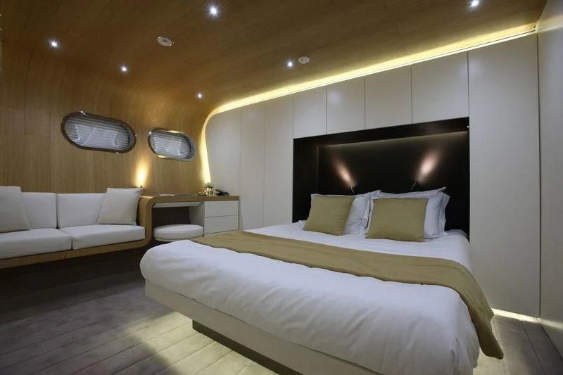 a bed in a room aboard OCEAN SAPPHIRE Yacht for Sale
