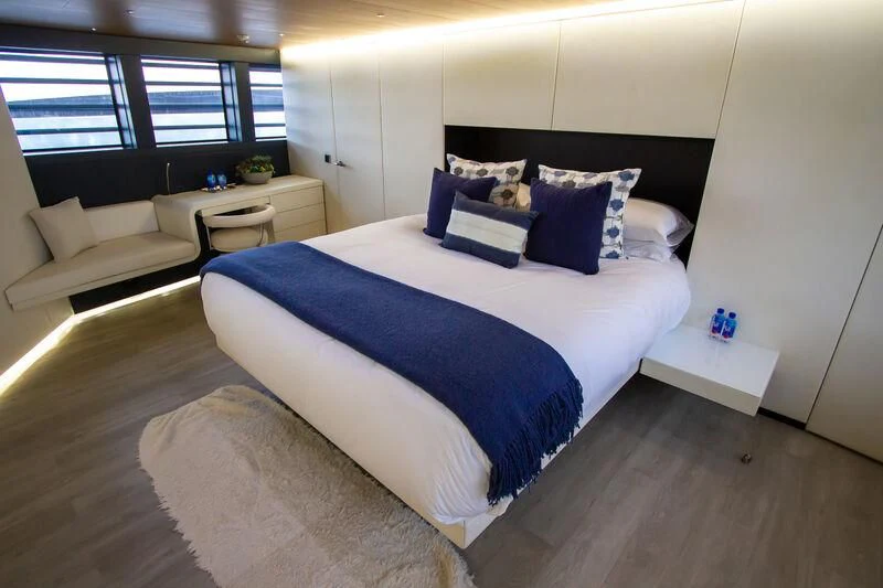 a bed in a room aboard OCEAN SAPPHIRE Yacht for Sale