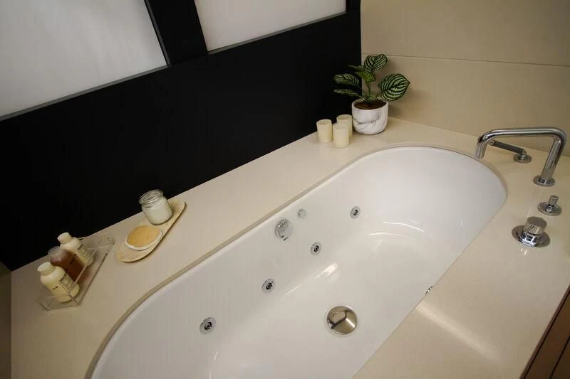 a bathroom sink with a black screen aboard OCEAN SAPPHIRE Yacht for Sale