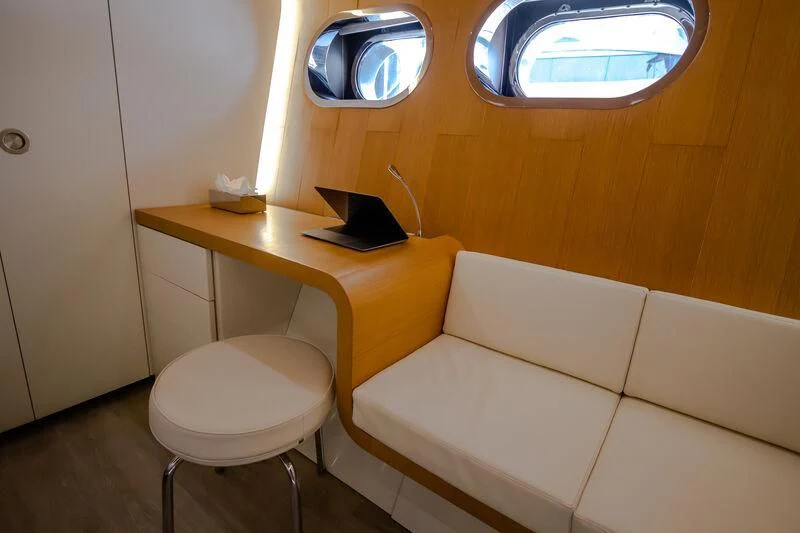 a room with a desk and a chair aboard OCEAN SAPPHIRE Yacht for Sale