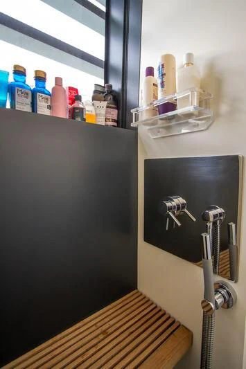 a refrigerator with a sink and a rack aboard OCEAN SAPPHIRE Yacht for Sale