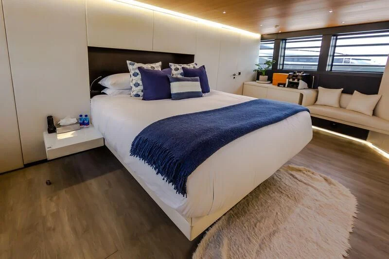 a bed in a room aboard OCEAN SAPPHIRE Yacht for Sale