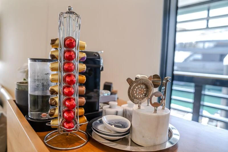 a vase with red and gold balls aboard OCEAN SAPPHIRE Yacht for Sale