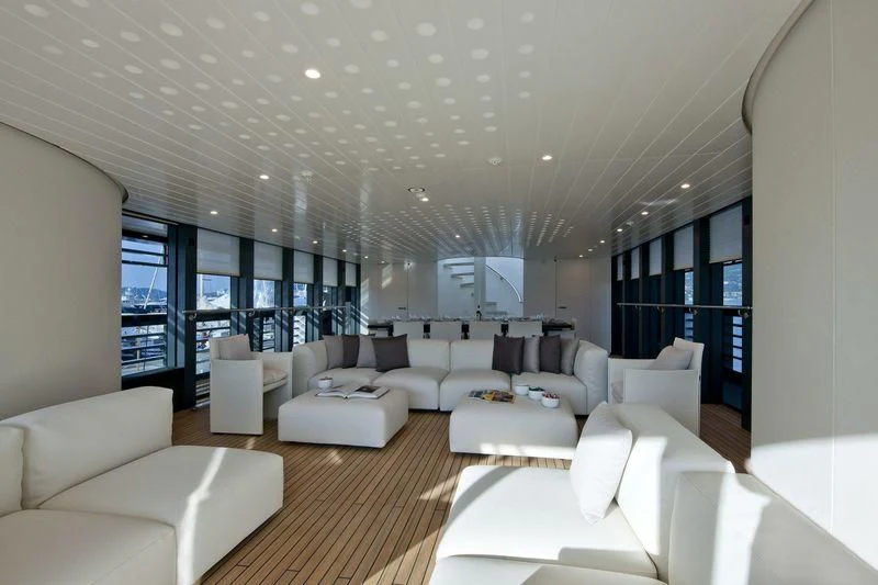 a living room with white furniture aboard OCEAN SAPPHIRE Yacht for Sale